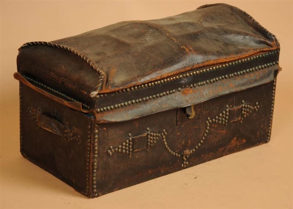 LARGE LEATHER WRAPPED WOODEN TRUNK.               