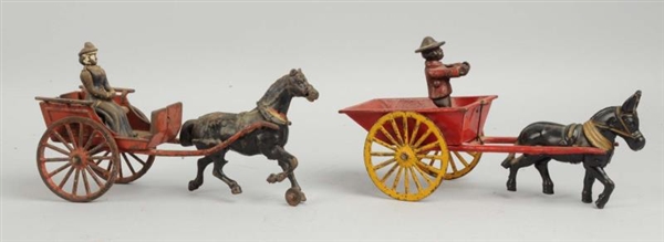 LOT OF 2: HORSE DRAWN CAST IRON CART TOYS         