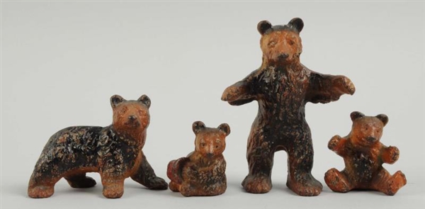 LOT OF 4: CAST IRON BEAR FAMILY PAPERWEIGHTS.     
