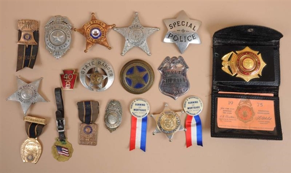 LOT OF ASSORTED POLICE AND POLITICAL BADGES.      