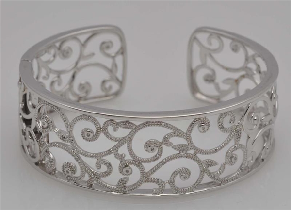 STERLING BRACELET WITH SMALL DIAMONDS.            