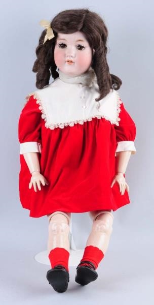 LARGE GERMAN BISQUE HEAD DOLL.                    