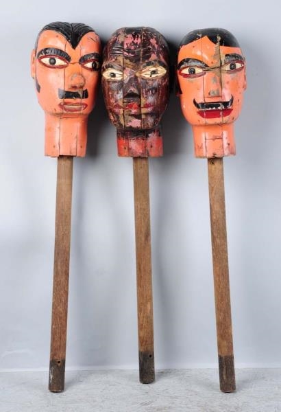LOT OF 3: WOODEN CARNIVAL HEADS.                  