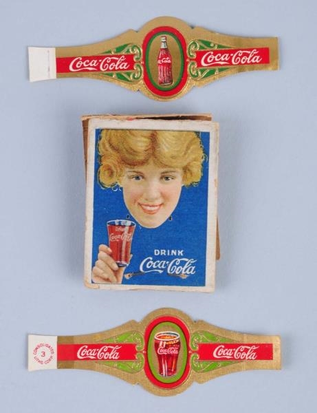 EARLY COCA - COLA MATCHBOOK AND CIGAR BANDS.      