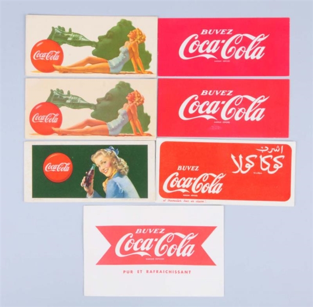 LOT OF 7: FOREIGN AND EXPORT COCA-COLA BLOTTERS.  