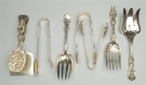 GROUP OF STERLING TONGS AND SERVING FORKS.        