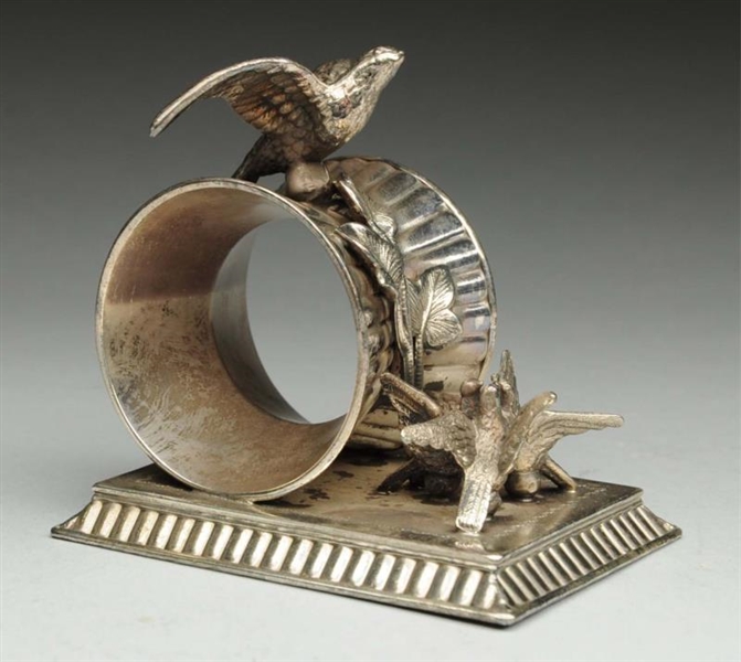 FIGURAL NAPKIN RING WITH BIRDS.                   