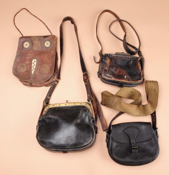 LOT OF 4: LEATHER POUCHES.                        
