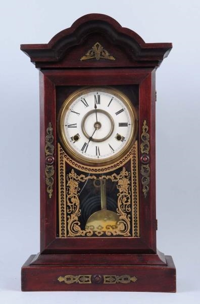 TIME AND STRIKE MANTLE CLOCK.                     
