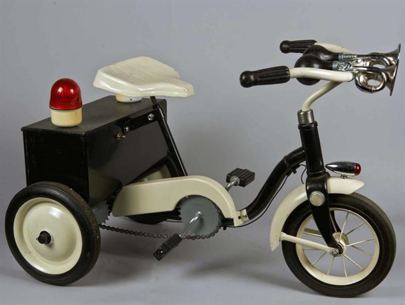 CHILDS POLICE TRICYCLE                           