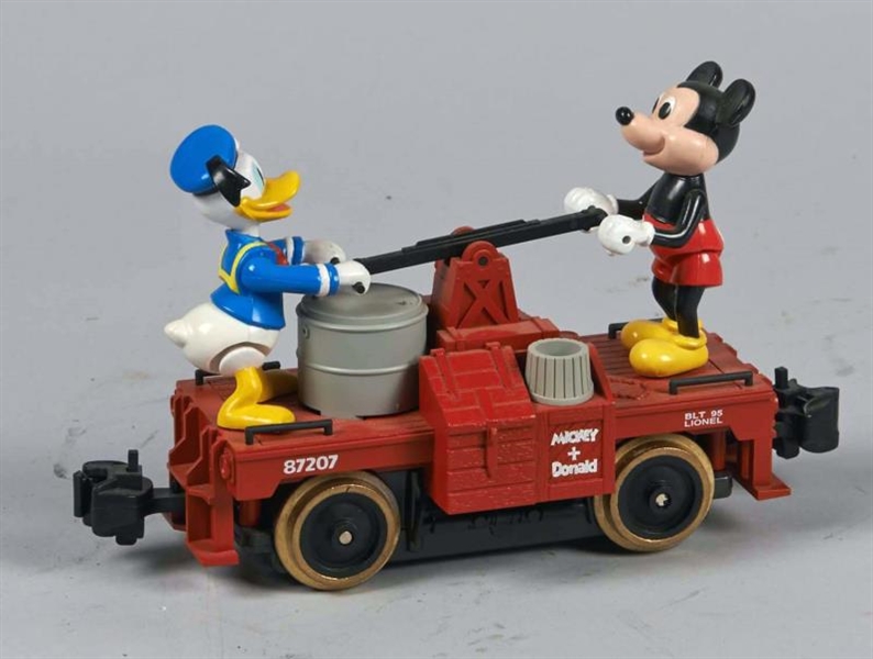 PLASTIC LIONEL MICKEY AND DONALD ELECTRIC HANDCAR 