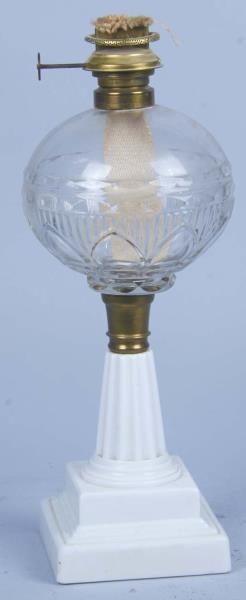 EAGLE KEROSENE LAMP ON WHITE STEPPED BASE         