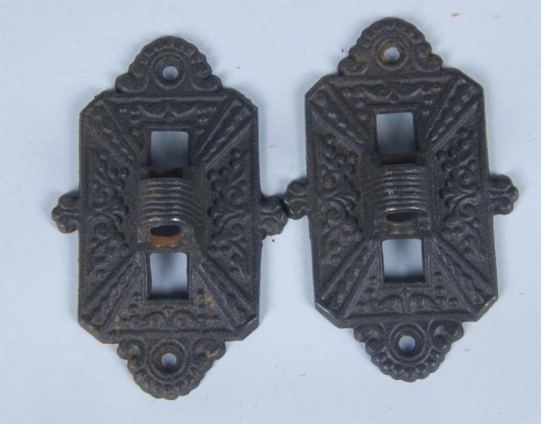 LOT OF 2 DECORATIVE CAST IRON LIGHT SWITCH COVERS 