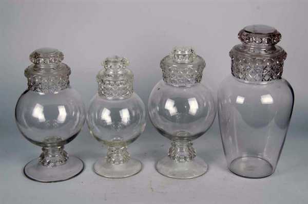 LOT OF 4: CLEAR GLASS COUNTERTOP CANDY JARS       