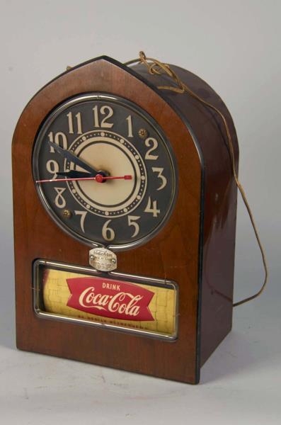 LIGHTED COCA COLA NEON CLOCK WITH MOVING AD PANEL 