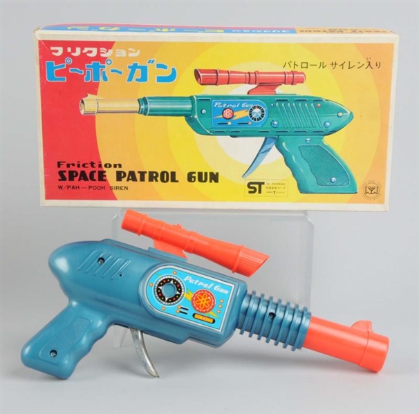 PLASTIC FRICTION SPACE PATROL GUN WITH BOX.       