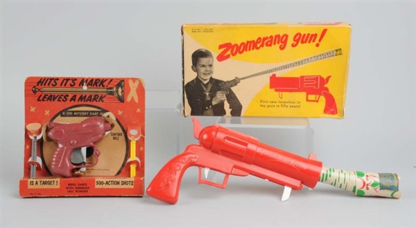 LOT OF 2: ZOOMERANG & DART GUNS WITH BOXES.       