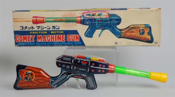 TIN & PLASTIC COMET MACHINE GUN WITH BOX.         