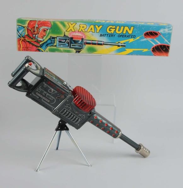 TIN LITHO BATTERY-OPERATED X-RAY GUN WITH BOX.    