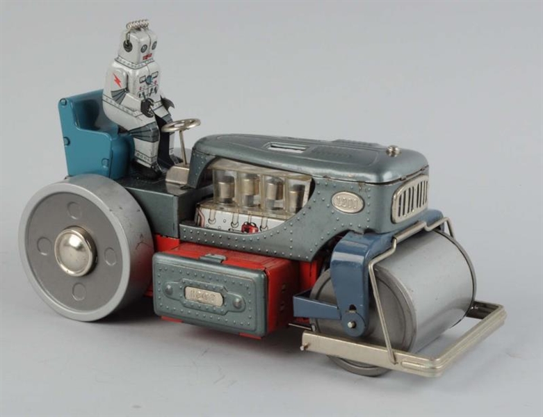 JAPANESE TIN LITHO BATTERY-OPERATED ROBOT TRACTOR 