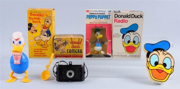 LOT OF 4: DONALD DUCK BOXED ITEMS.                