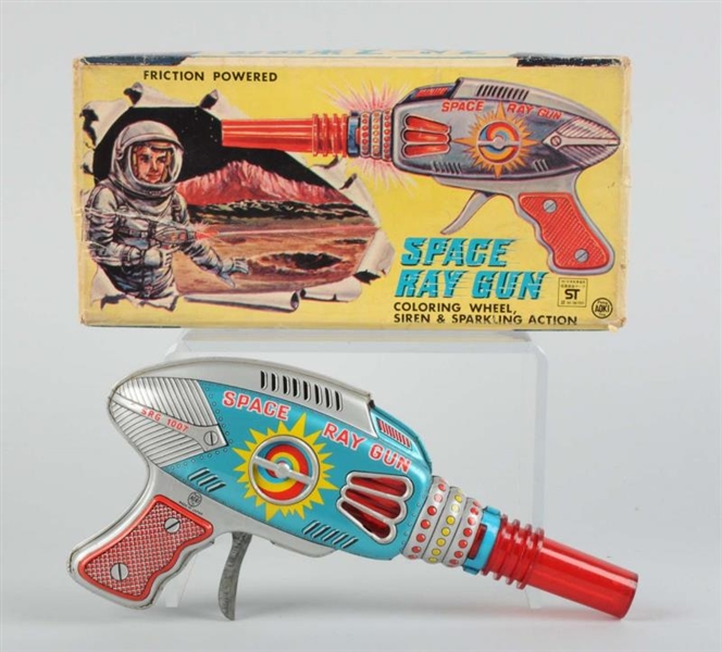 TIN & PLASTIC SPACE RAY GUN IN ORIGINAL BOX.      