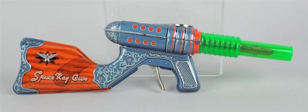 TIN & PLASTIC DOUBLE BARREL SPACE GUN.            