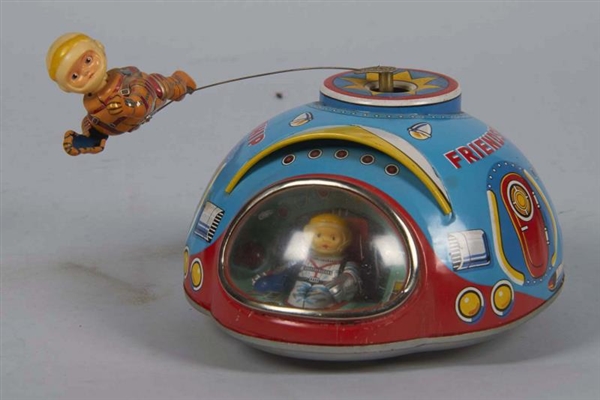 BATTERY OPERATED FRIENDSHIP NO. 7 TIN TOY         