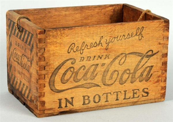 1920S COCA-COLA DOVETAILED WOODEN CARRIER.       