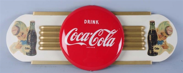 1950S COCA-COLA BUTTON ON WINGS.                  