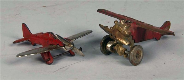 LOT OF 2 CAST IRON HUBLEY TOY AIRPLANES.          