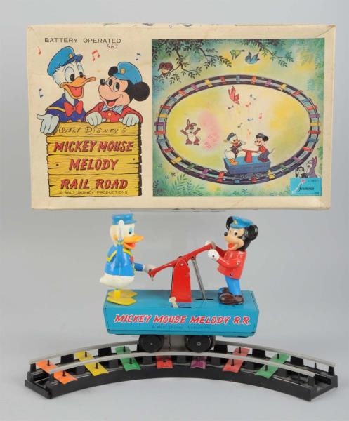 TIN BATTERY-OPERATED MICKEY MOUSE MELODY R.R.     