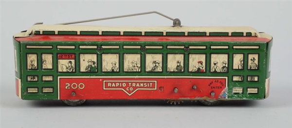 TIN LITHO WIND-UP RAPID TRANSIT TROLLEY CAR TOY.  