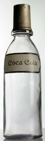 C. 1910 COCA-COLA FIRED LABEL SYRUP BOTTLE.       
