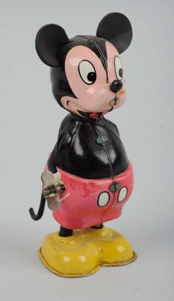 DISNEY TIN LITHO WIND - UP LINEMAR WIRLTAIL TOY.  