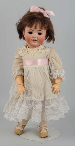 GERMAN BISQUE HEAD CHARACTER TODDLER DOLL.        