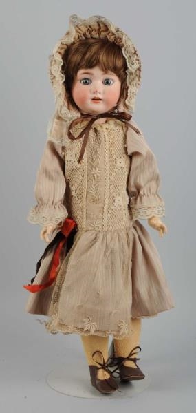LARGE GERMAN BISQUE HEAD DOLL ON COMP. BODY.      