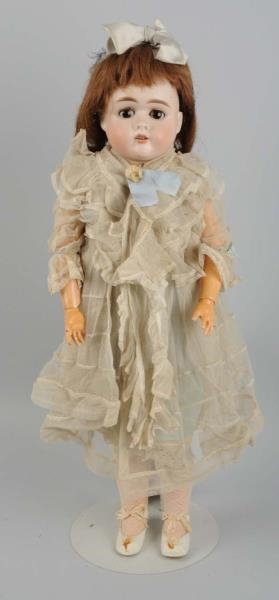 GERMAN BISQUE HEAD DOLLY FACE DOLL.               