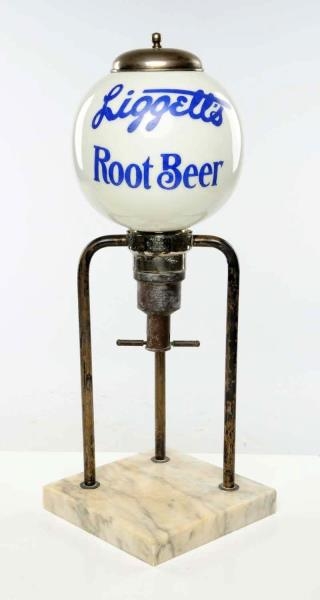 EARLY LIGGETT’S ROOT BEER SYRUP DISPENSER.        