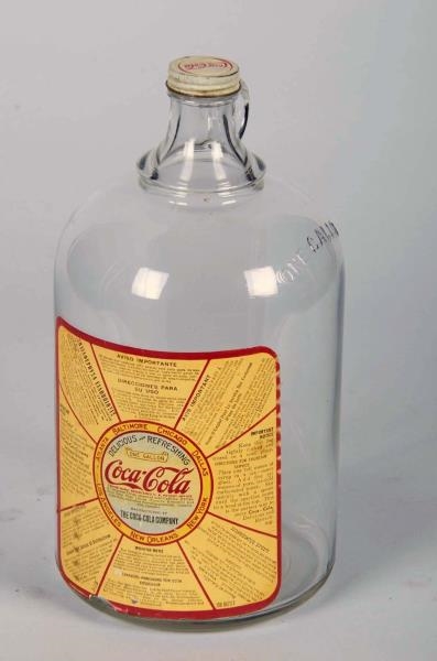 COCA COLA GLASS SYRUP JUG WITH LABEL AND LID      