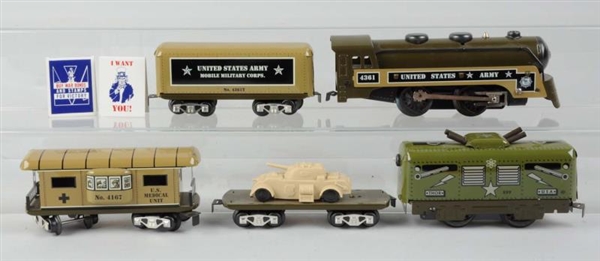 ASSORTED MARX MILITARY TRAINS.                    