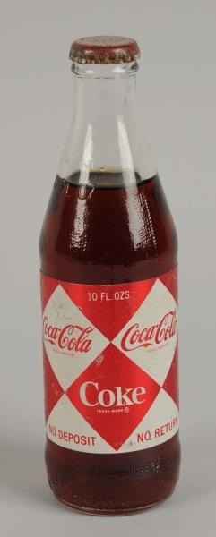 1960S COCA-COLA PAPER LABEL 10OZ. BOTTLE.         