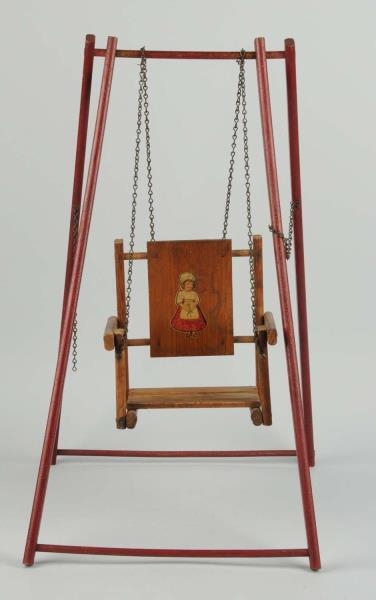 ANTIQUE WOODEN DOLL SWING.                        
