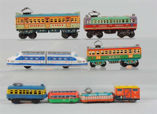 LOT OF 8: ASSORTED JAPANESE TIN TOY TRAINS.       