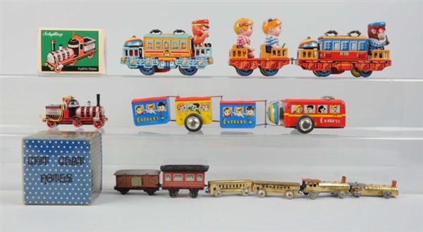LOT OF 5: WIND - UP TOY TRAINS.                   