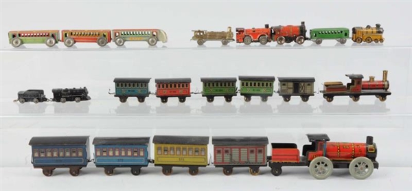 LOT OF 20: ASSORTED TIN LITHO TOY LOCOMOTIVES.    
