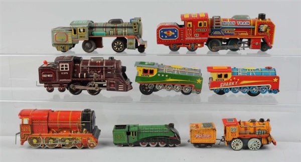 9 ASSORTED TIN LITHO TRAINS MOSTLY JAPANESE.      