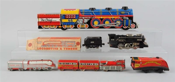 LOT OF 7: TOY TRAINS MOSTLY MARX.                 