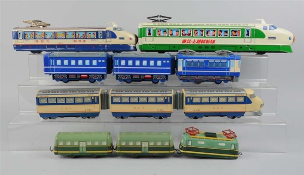 LOT OF 6: TOY TRAINS.                             
