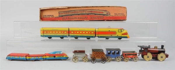 LOT OF 7: ASSORTED TOY TRAINS.                    